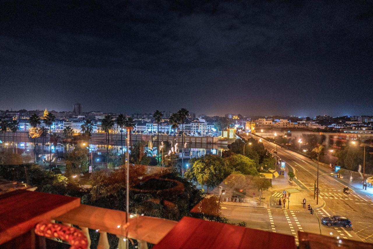 Hotel Lobby Σεβίλλη Εξωτερικό φωτογραφία Rabat at night
