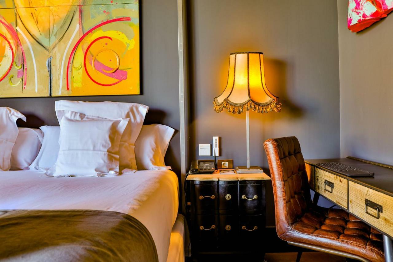 Hotel Lobby Σεβίλλη Εξωτερικό φωτογραφία A bedroom at the Hotel Indigo